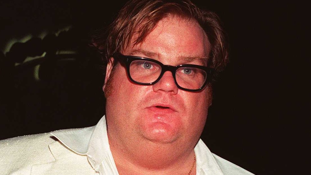 Chris Farley with glasses