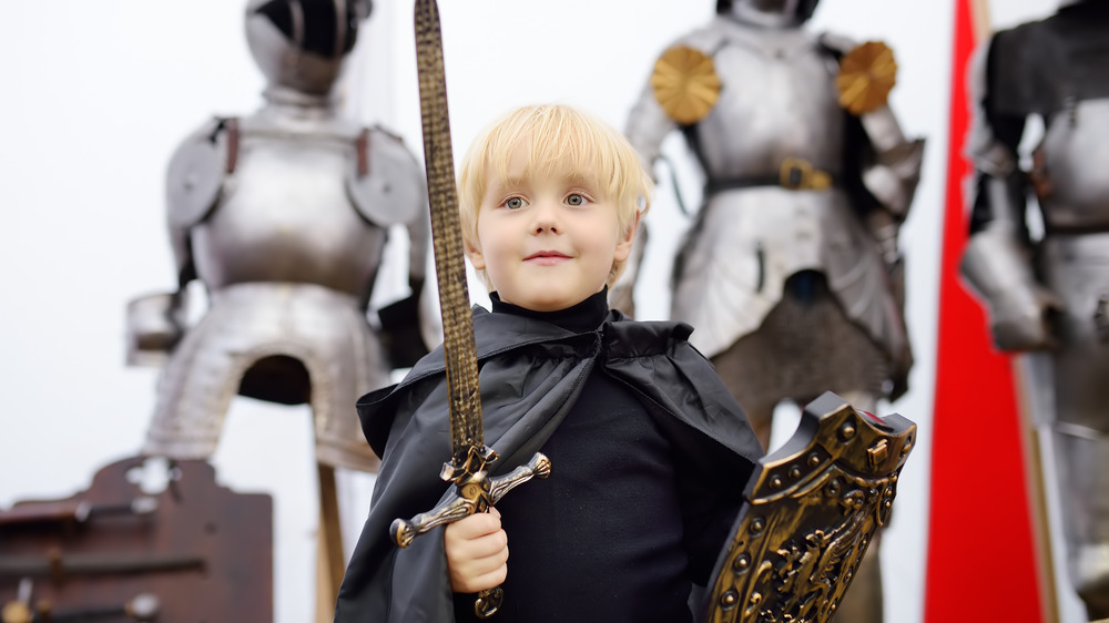 little boy dressed as a knight