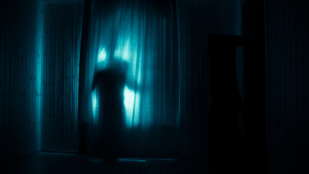 A ghostly figure lurks  