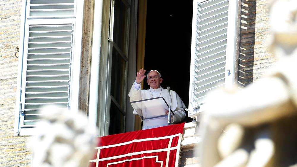 Pope Francis at the window of his apartment