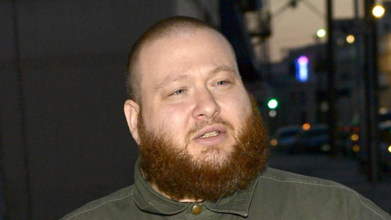 Action Bronson looking to the side
