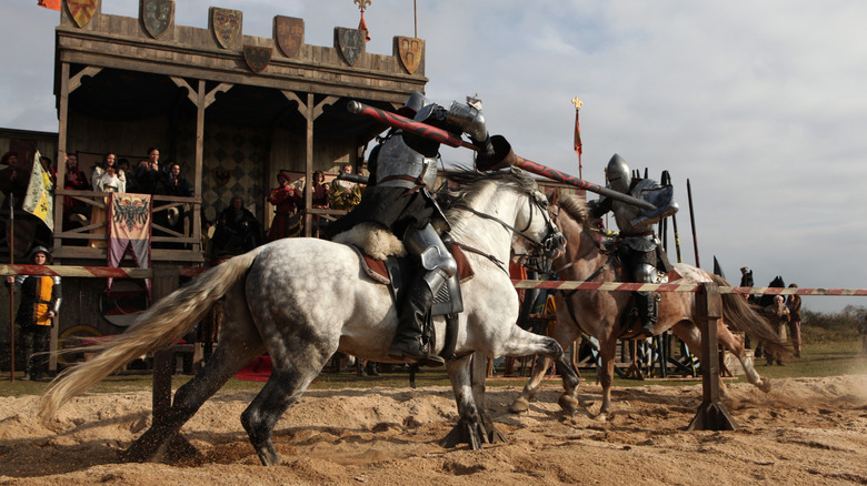 Two knights jousting