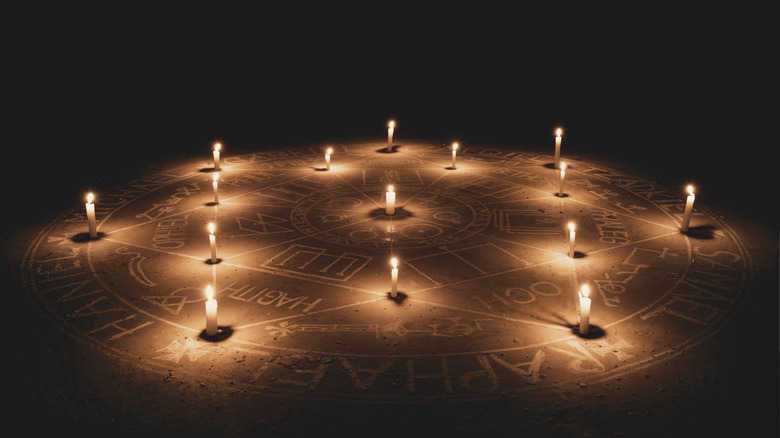 Hexagram lit by candles