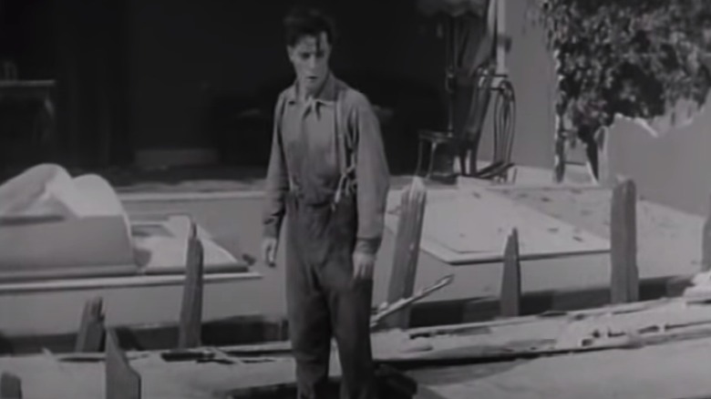 A house falls around Buster Keaton