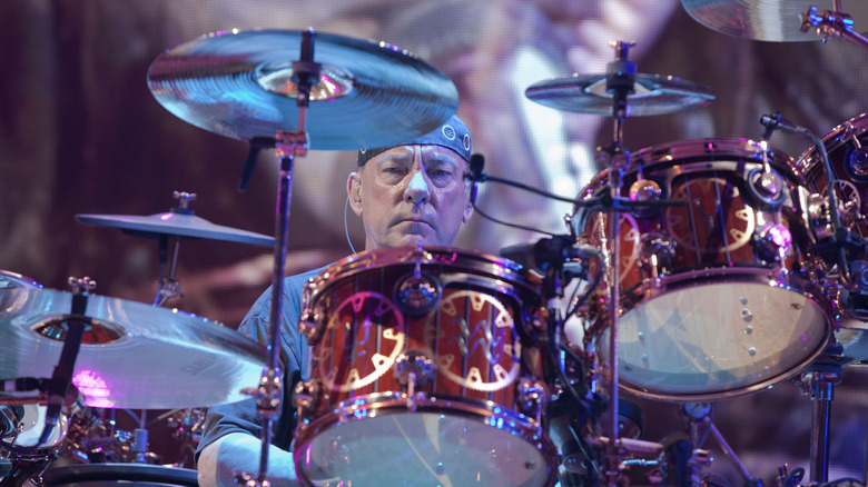 Neil Peart performing on stage