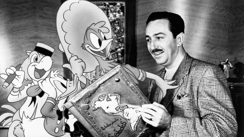 Walt Disney next to cartoon characters